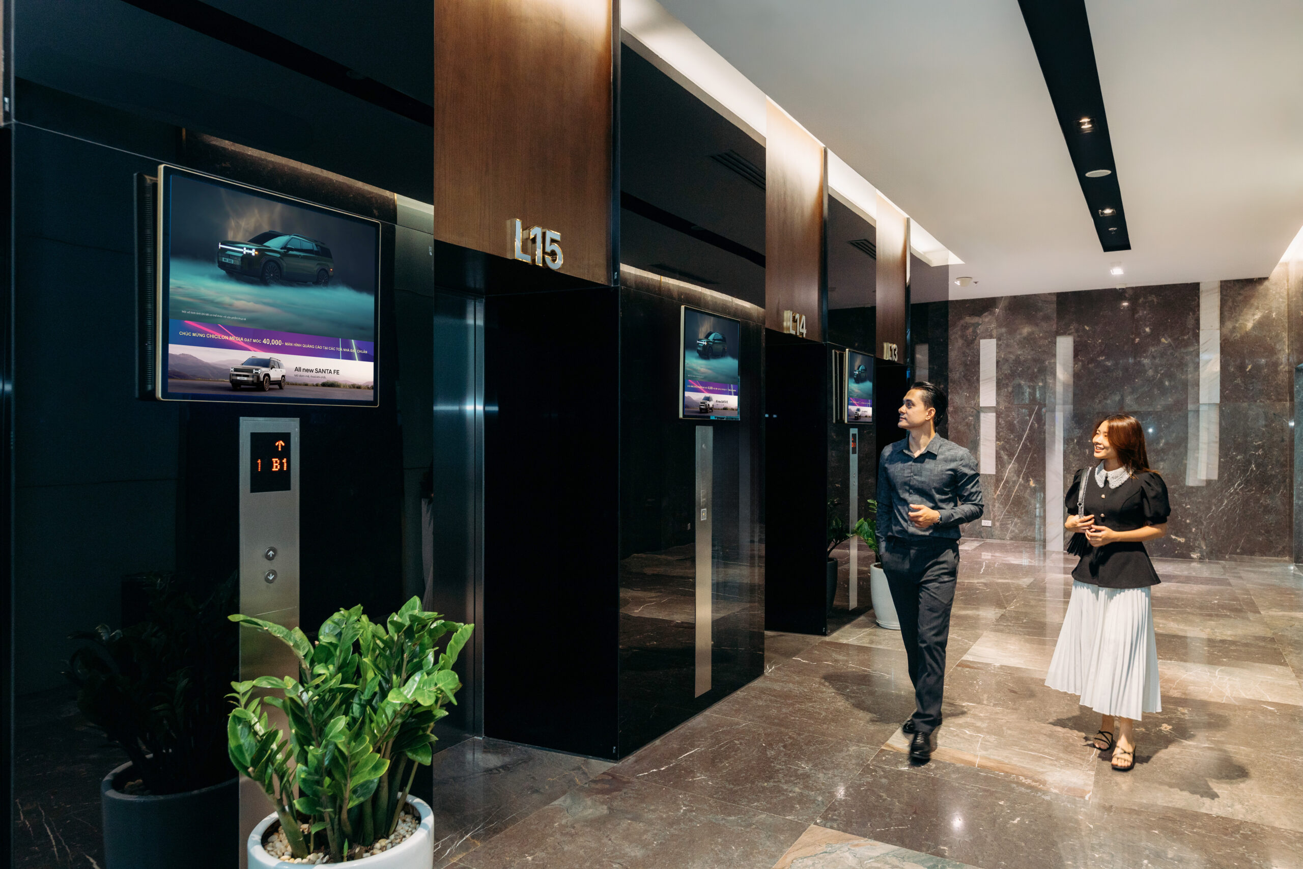 chicilon media's advertising screens installed in elevator lobbies